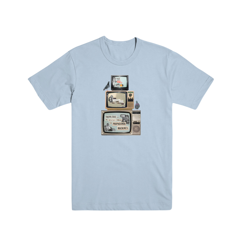 Threat Level Pigeon Tee front — light blue Gildan heavy cotton tee with stacked TVs and pigeons graphic